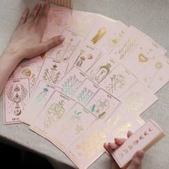 CRAFTERIAN Mistyc Minimalistic Tarot Cards With Rainbow Foil 78 Tarot Deck With Gold Edges, For Beginners And Experts With Guide Book. (Pink) 14 CRAFTERIAN Mistyc Minimalistic Tarot Cards With Rainbow Foil 78 Tarot Deck With Gold Edges, For Beginners And Experts With Guide Book. (Pink) -Folkmanis Toys Shop 51SsQGGzZrL