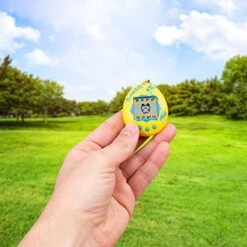 Tamagotchi 42812 Original Yellow & Blue - Feed, Care, Nurture-Virtual Pet With Chain For On The Go Play -Folkmanis Toys Shop 51TD0Hx2hAL 1