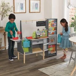 KidKraft Alexa-Enabled 2-in-1 Wooden Kitchen & Market With Lights And Sounds, Interactive Foods And Games Plus 105 Accessories -Folkmanis Toys Shop 51jd5UoyBIL