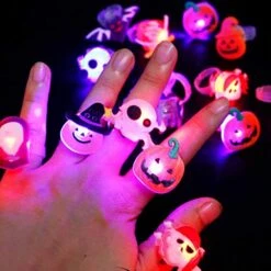 Rvikurc 50PC Christmas Light Up Rings Party Favors For Kids, Glow In The Dark Christmas Party Supplies For Girls Boys, Christmas Stocking Goodie Bag Stuffers Fillers -Folkmanis Toys Shop 51ylT0zvI6L